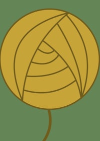 a yellow ball of yarn on a green background